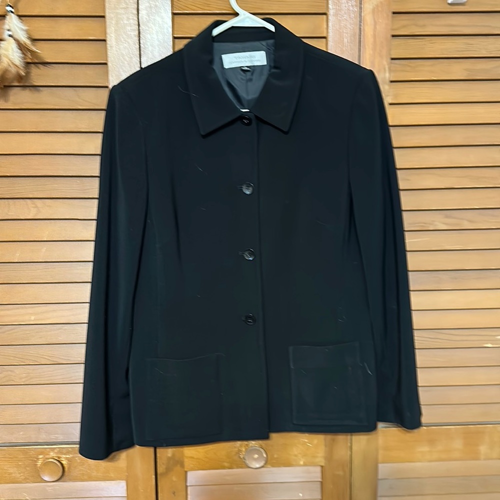 Lightweight jacket. Big buttons and satin lining.